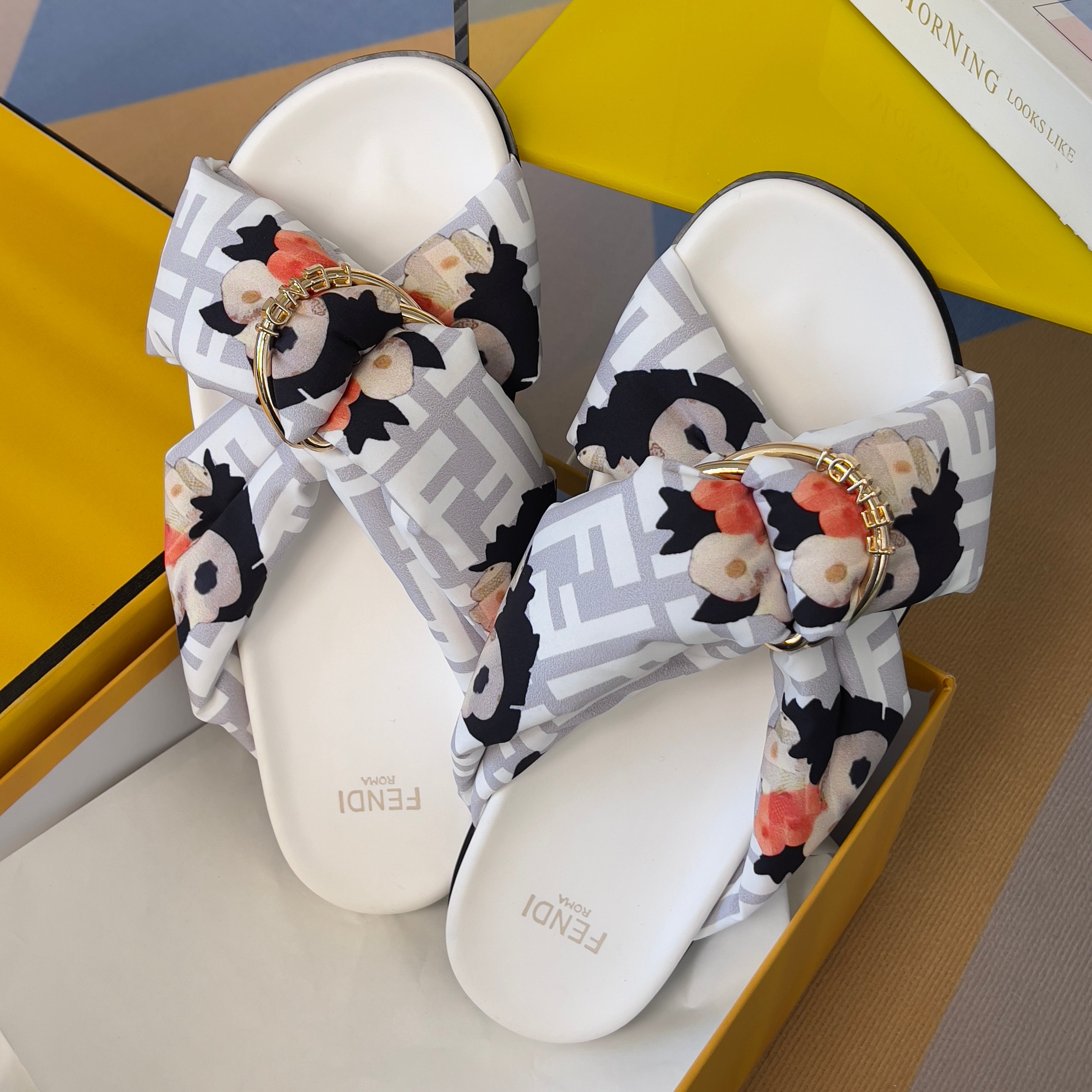 FENDI 26S PATTERNED CROSS-STRAP SLIDE SANDALS IN MULTICOLOR FABRIC