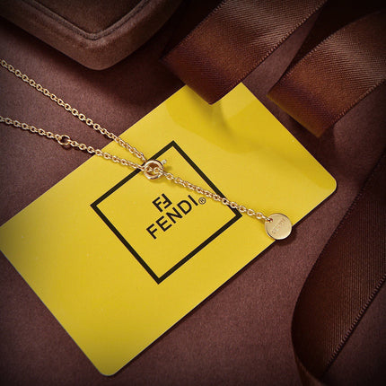 FENDI 26S BAG CHARM PENDANT NECKLACE IN GOLD TONE METAL 625602