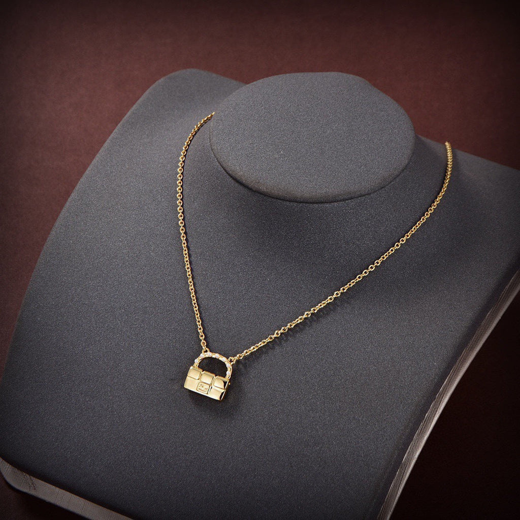 FENDI 26S BAG CHARM PENDANT NECKLACE IN GOLD TONE METAL 625602