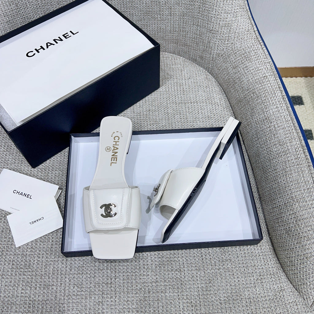 CHANEL 26S FLAT SLIDES IN WHITE LAMBSKIN