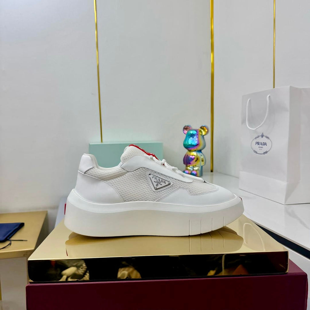 PRADA 25S CROSS LACED SNEAKERS IN WHITE CALFSKIN