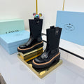PRADA 25S HIGH MARTIN BOOTS 50MM IN BLACK GLOSSY CALFSKIN