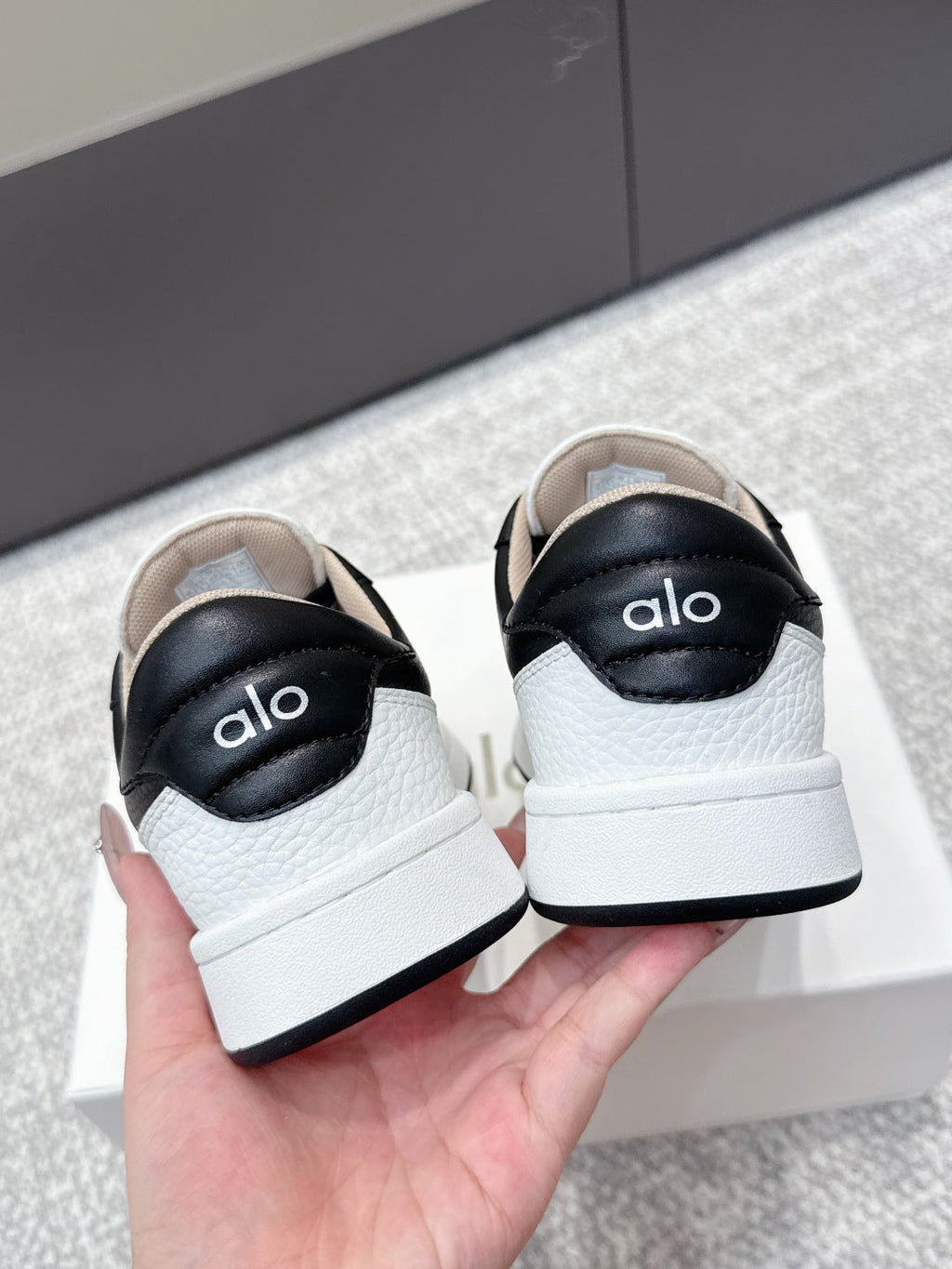 ALO 25S SNEAKER IN BLACK AND WHITE LAMBSKIN