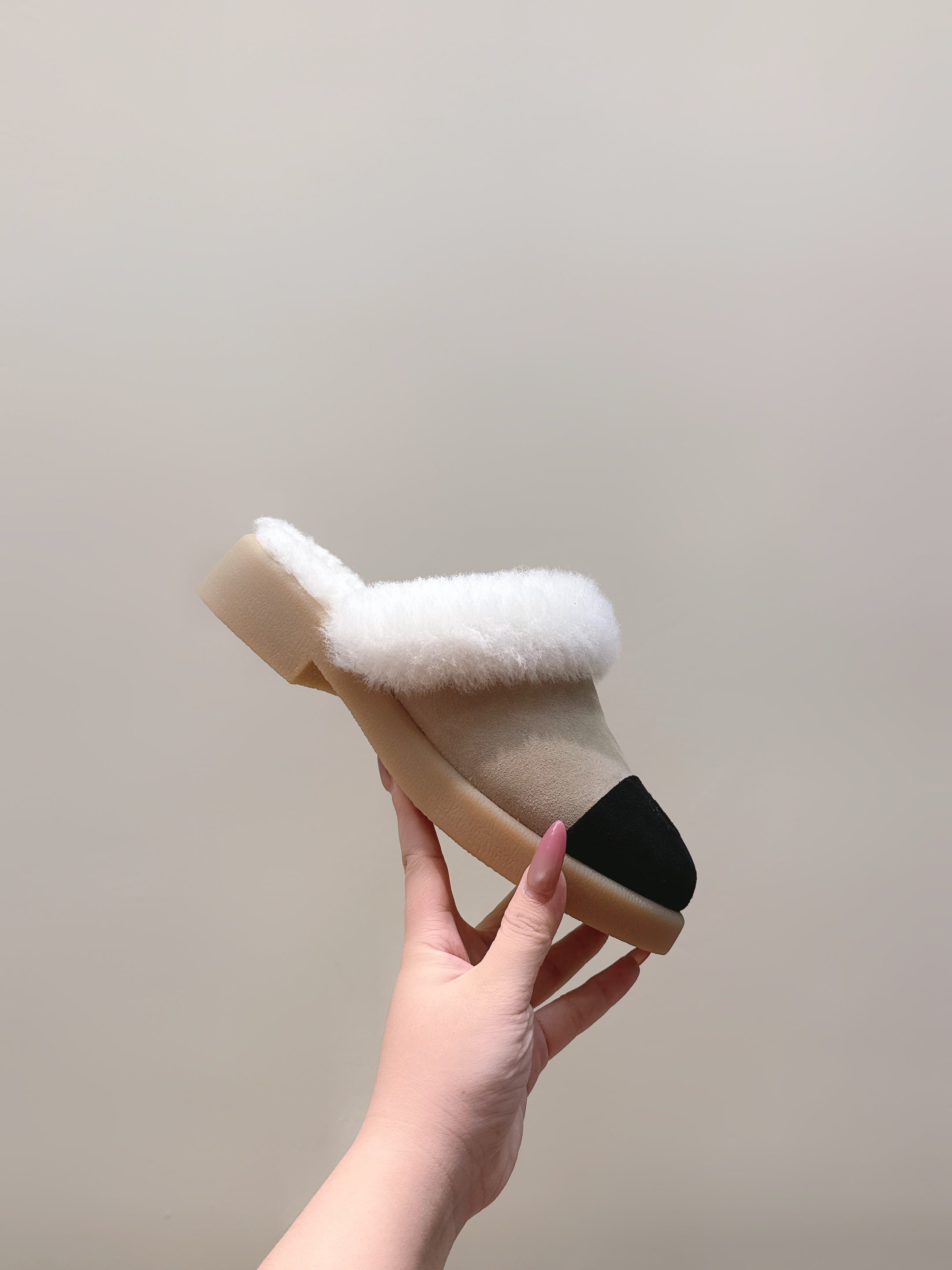CHANEL 25S FUR-LINED MULES IN BEIGE AND BLACK SUEDE