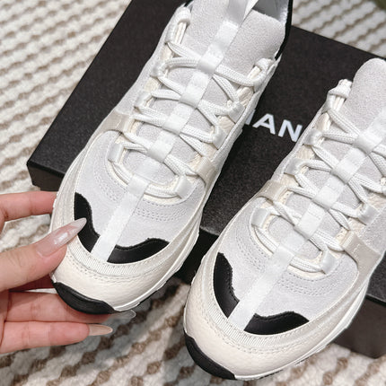 CHANEL 25S LUXURY SNEAKERS IN WHITE CALFSKIN AND SUEDE