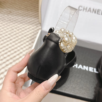 CHANEL 25S ESPADRILLE FLATS IN BLACK CALFSKIN WITH PEARL STRAP