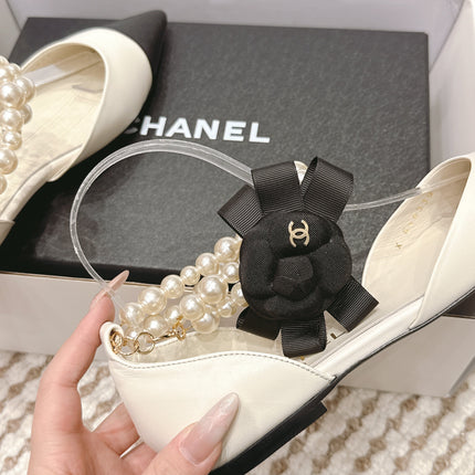 CHANEL 25S ESPADRILLE FLATS IN WHITE AND BLACK CALFSKIN WITH PEARL STRAP