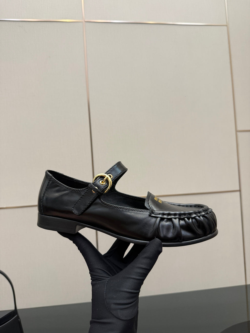MIUMIU 25S LOAFERS WITH STRAP IN BLACK LAMBSKIN