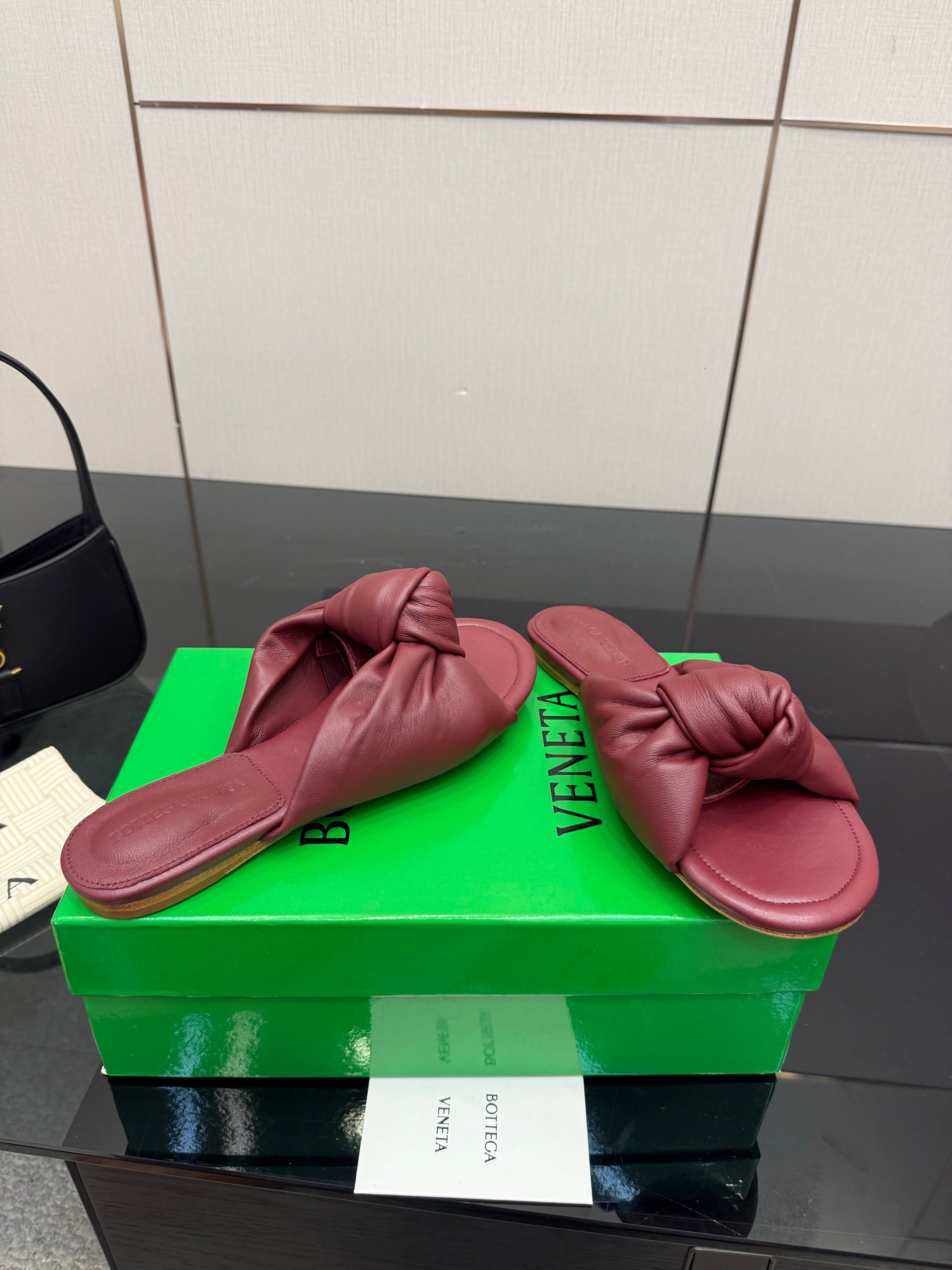 BOTTEGA VENETA 26S SLIDE SANDALS IN DARK RED LAMBSKIN