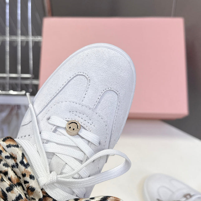 MIUMIU 25S SNEAKERS IN WHITE SUEDE WITH LEOPARD-PRINT LACES