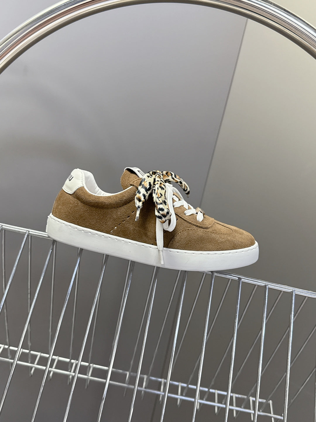 MIUMIU 25S SNEAKERS IN EARTH BROWN SUEDE WITH LEOPARD-PRINT LACES
