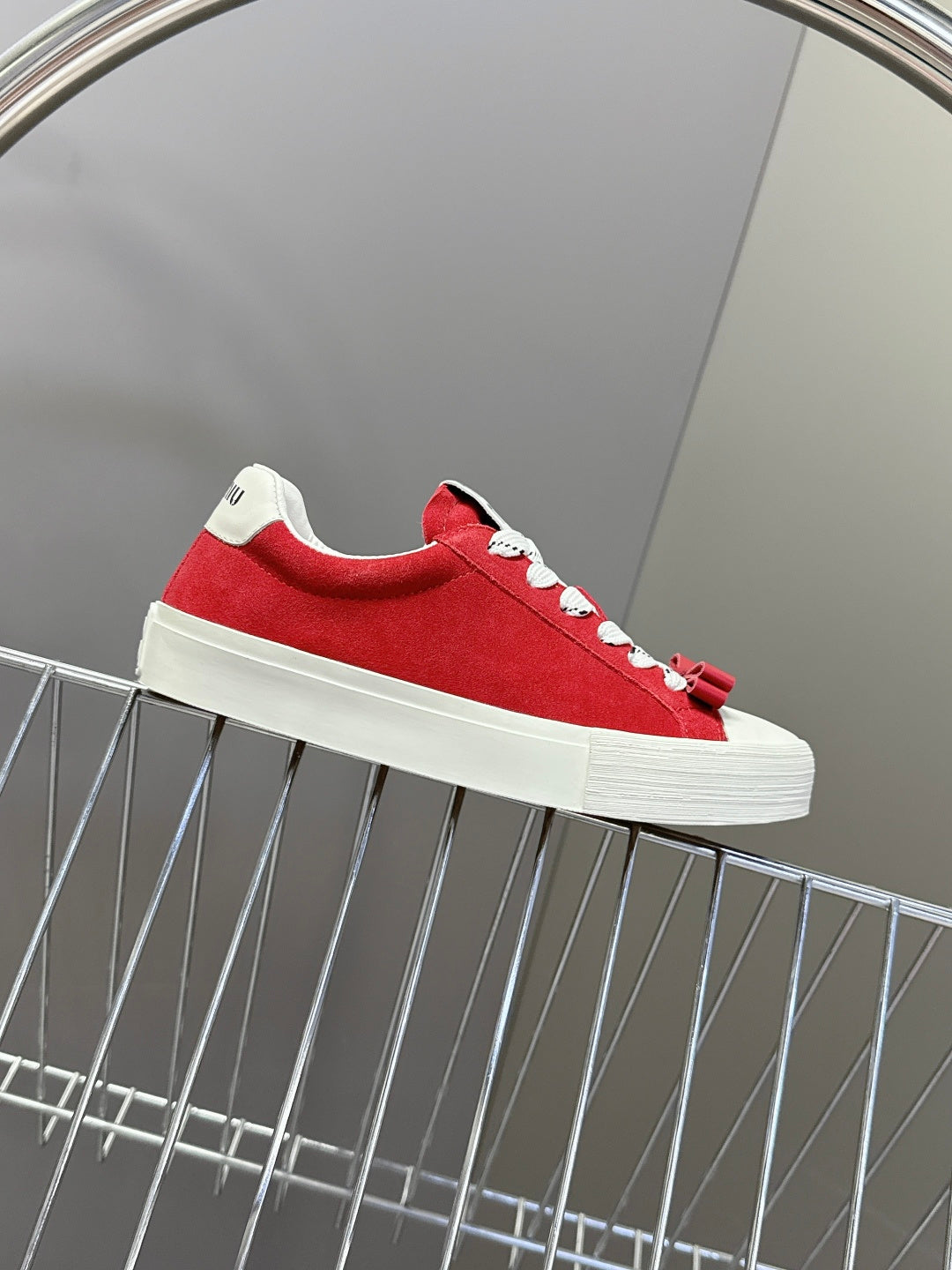 MIUMIU 25S SNEAKERS IN DARK RED SUEDE