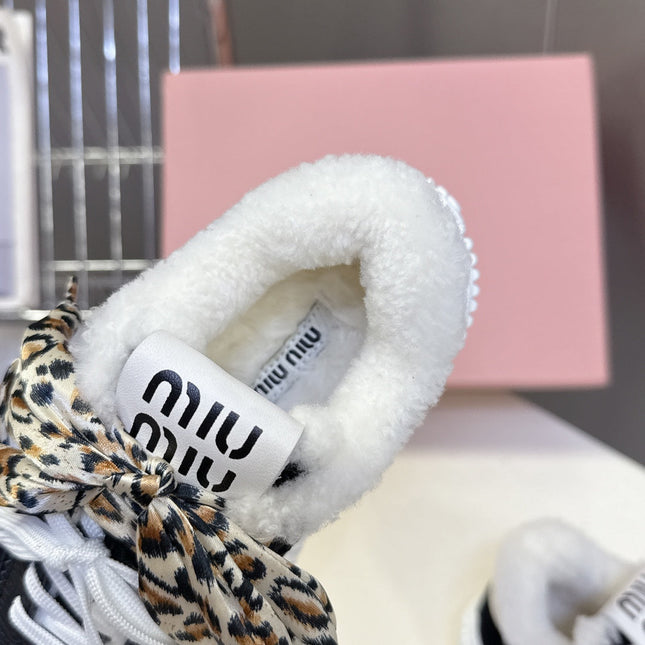MIUMIU 25S SNEAKERS 45MM IN BLACK SUEDE WITH LEOPARD-PRINT LACES SHEARLING