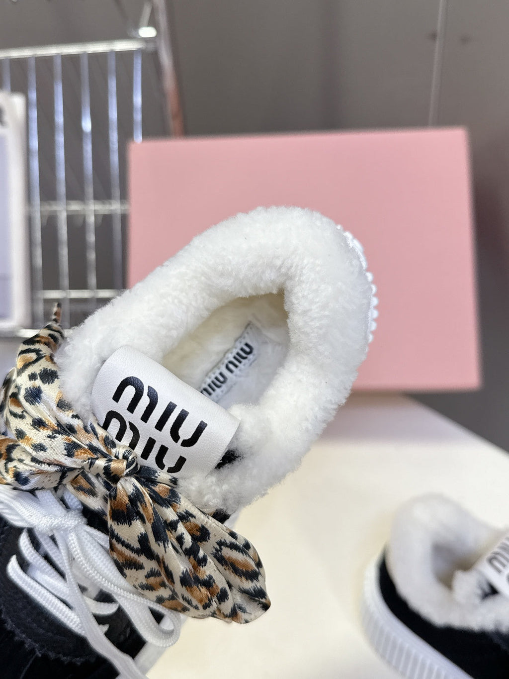 MIUMIU 25S SNEAKERS 45MM IN BLACK SUEDE WITH LEOPARD-PRINT LACES SHEARLING