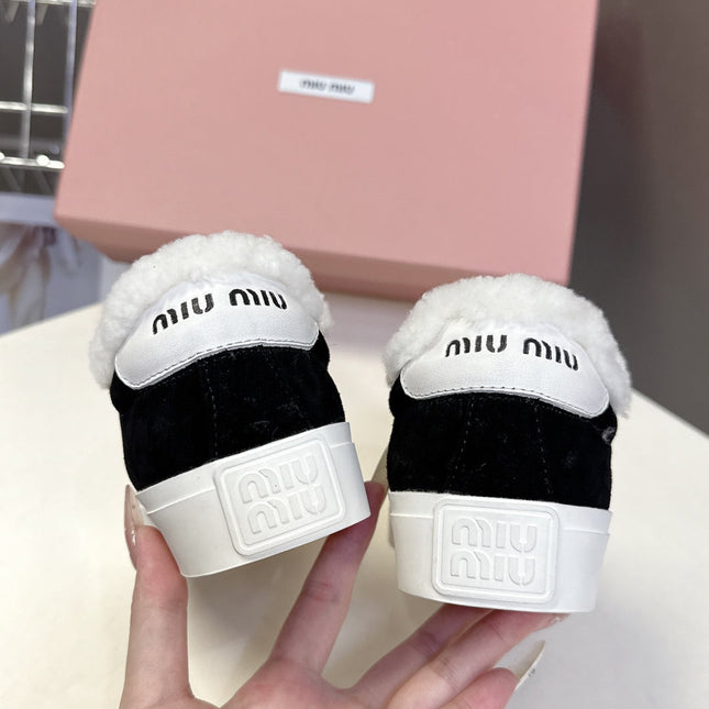 MIUMIU 25S SNEAKERS IN BLACK SUEDE WITH SHEARLING