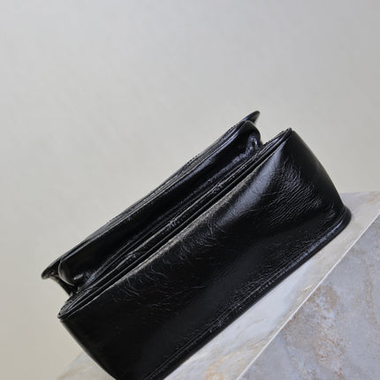 YSL 25S NIKI MM BAG 28 IN BLACK GLOSSY CALFSKIN GOLD HARDWARE