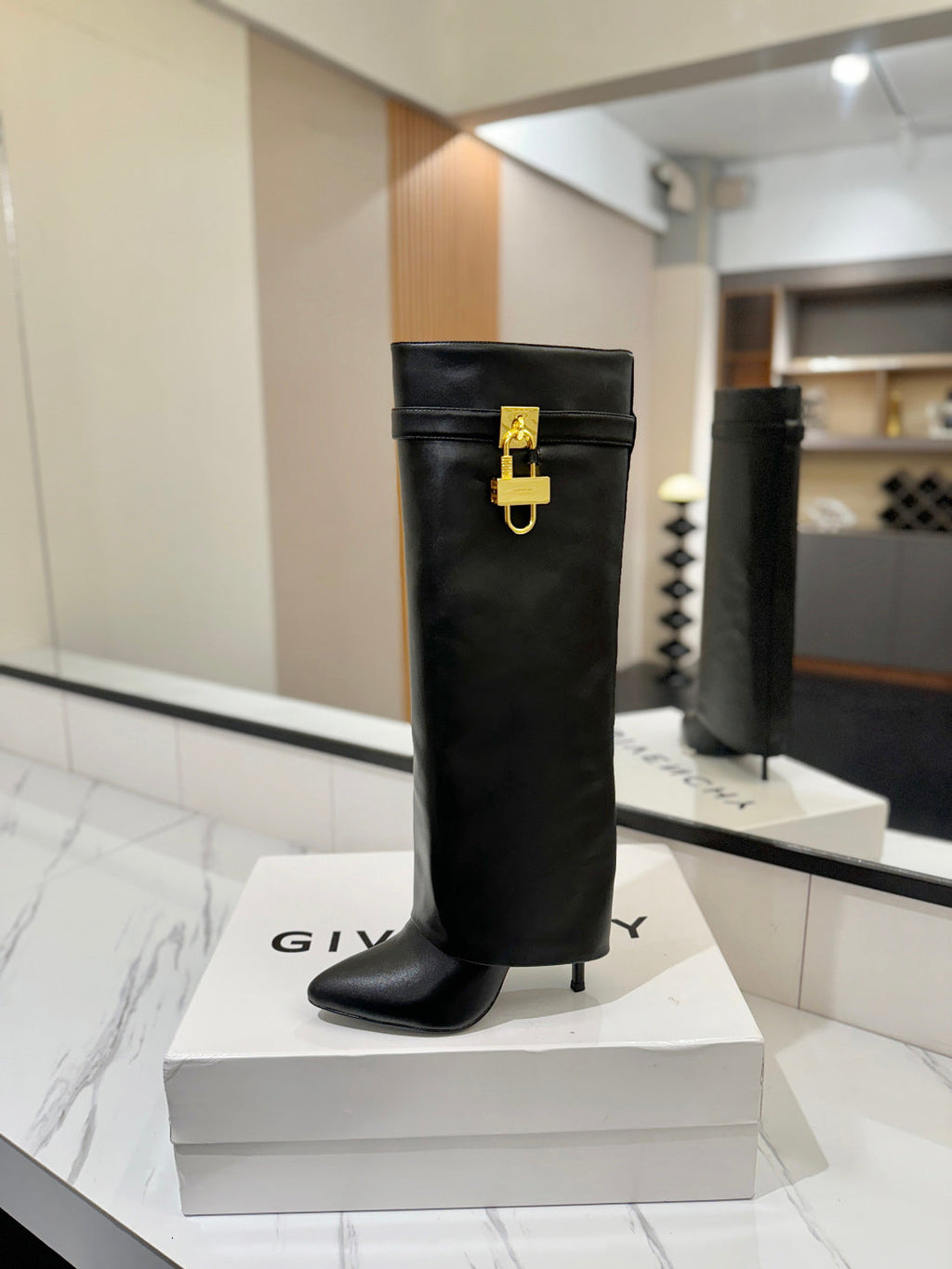 SHARK LOCK BOOTS IN BLACK CALFSKIN GOLD HARDWARE