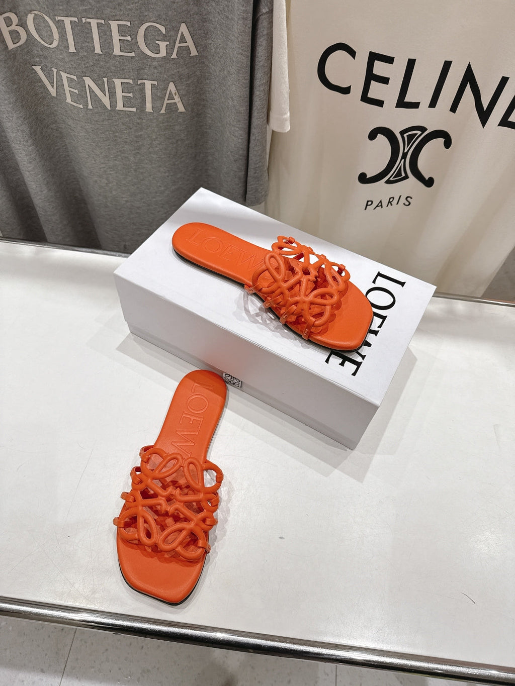LOEWE 26S PETAL ANAGRAM SLIDE IN BURNT ORANGE CALFSKIN