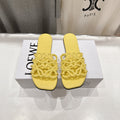 LOEWE 26S PETAL ANAGRAM SLIDE IN YELLOW CALFSKIN