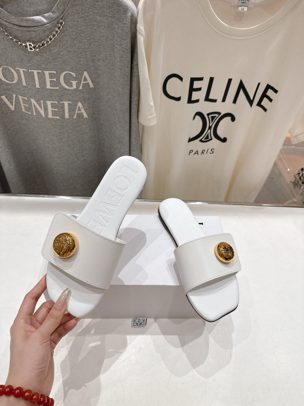 LOEWE 26S PEBBLE SLIDE IN WHITE CALFSKIN GOLD HARDWARE