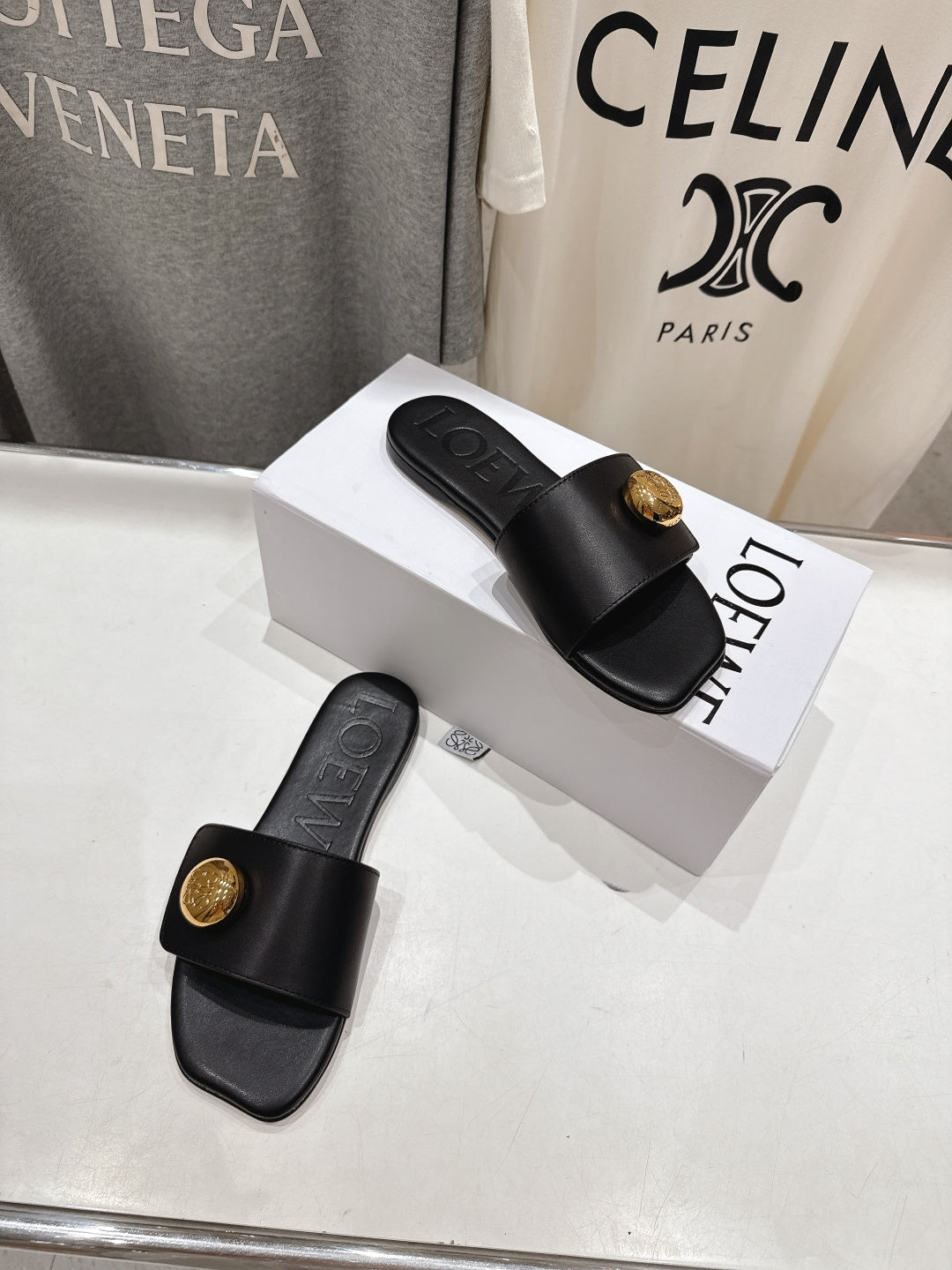 LOEWE 26S PEBBLE SLIDE IN BLACK CALFSKIN GOLD HARDWARE