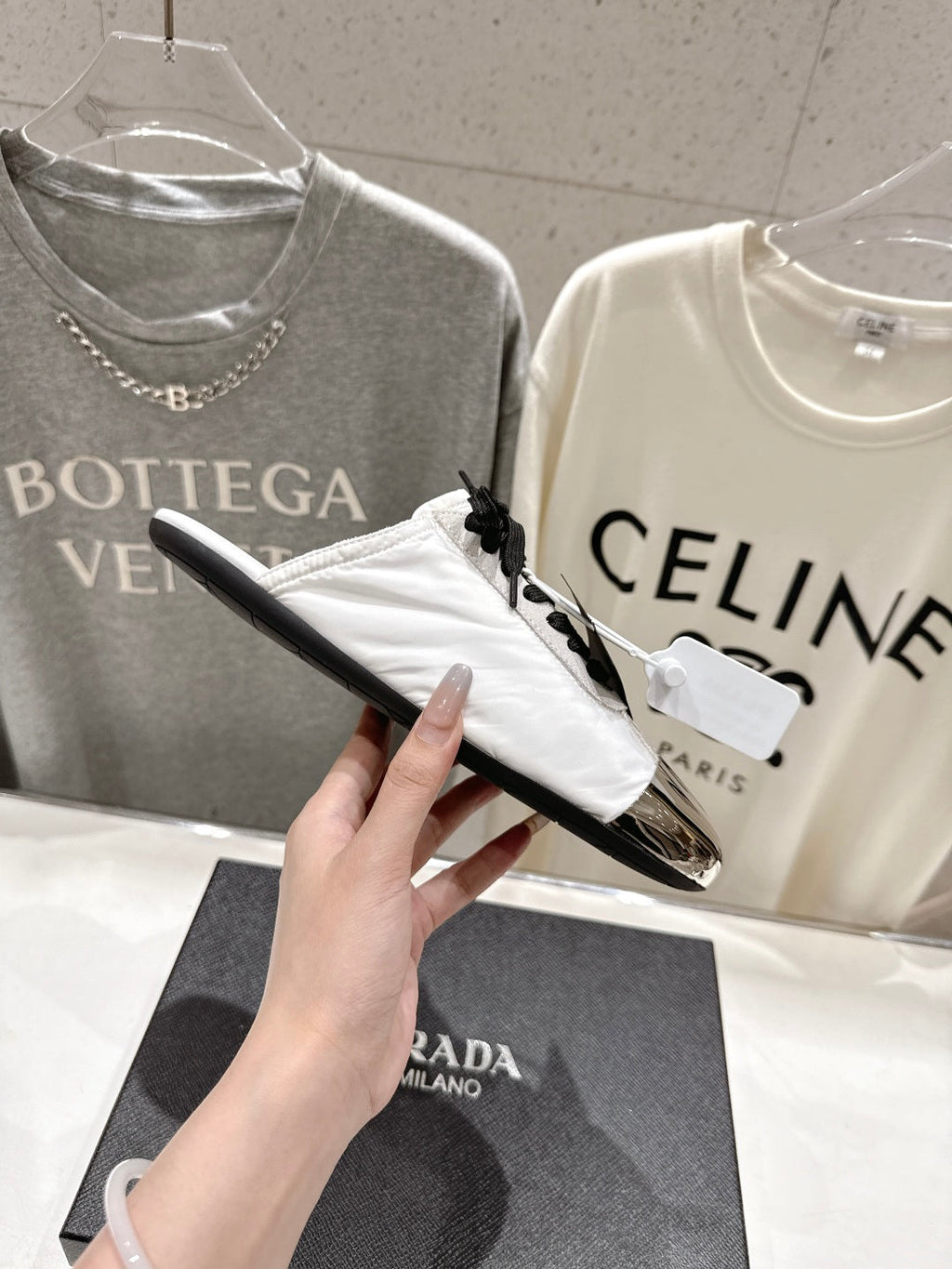 PRADA 25S MULES IN WHITE WITH METAL TOECAP