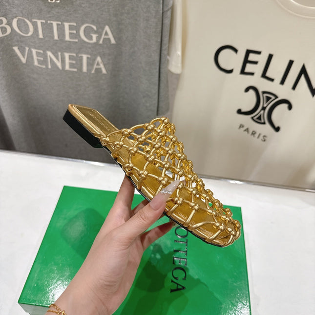 BOTTEGA VENETA 26S WOVEN MULES IN GOLD LAMBSKIN