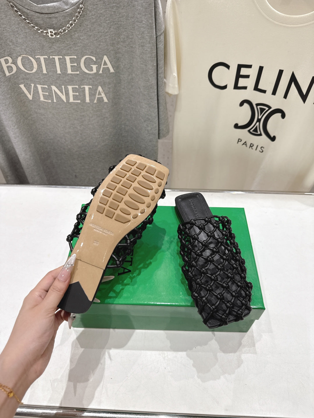 BOTTEGA VENETA 26S WOVEN MULES IN BLACK LAMBSKIN