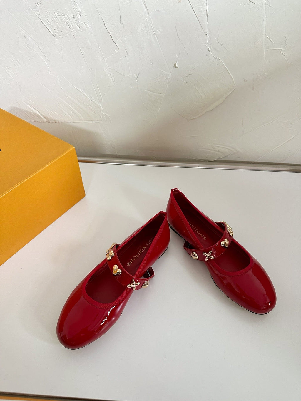 ROMY FLAT BALLERINA IN RUBY RED PATENT CALFSKIN