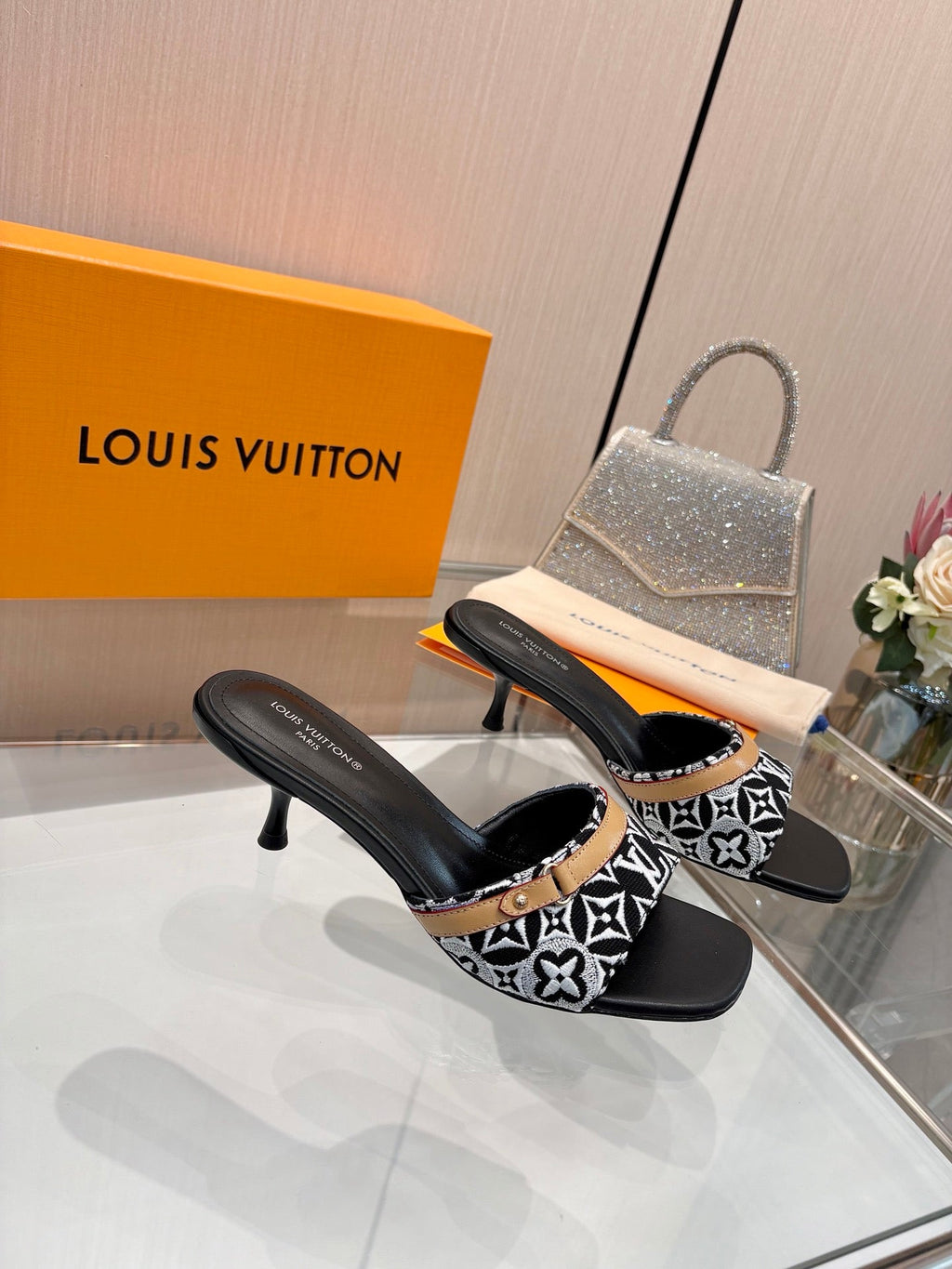 LV 26S HIGH-HEELED MULES 55 MM IN BLACK AND WHITE EMBROIDERED MONOGRAM CANVAS