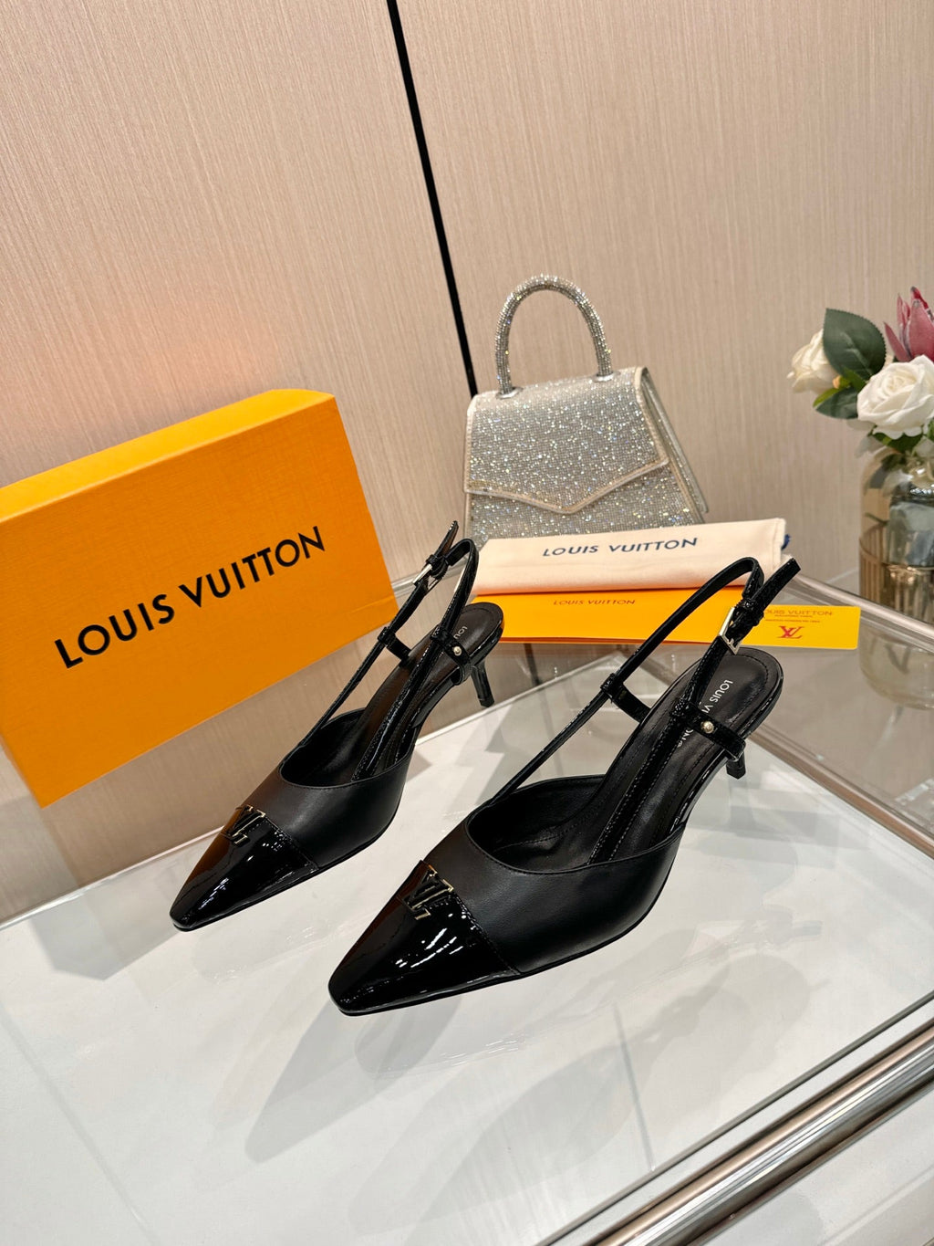 LV 26S SLINGBACK PUMPS 55 MM IN BLACK FABRIC AND CALFSKIN