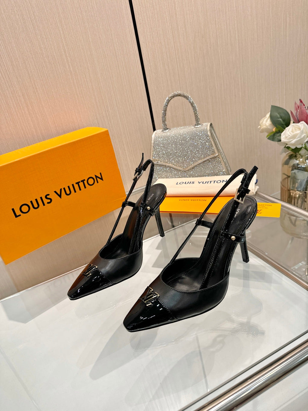 LV 26S SLINGBACK PUMPS 90 MM IN BLACK CALFSKIN