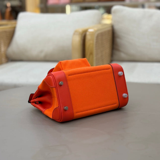 HM 25S BIRKIN CARGO 25 CM IN DARK ORANGE CANVAS AND SWIFT WITH SILVER HARDWARE