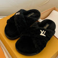 LV BLISS COMFORT MULE IN BLACK SHEARLING