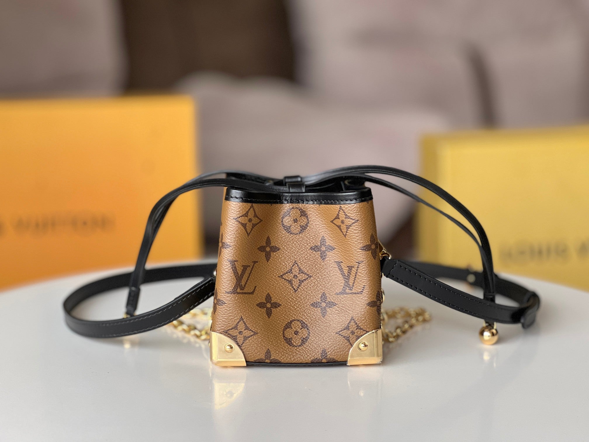 NOE PURSE 11.5 NANO CHARM BROWN MONOGRAM REVERSE CANVAS