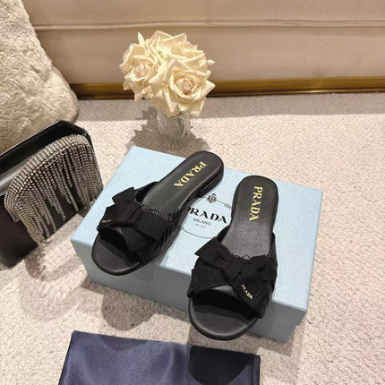 PRADA 26S RUCHED BOW SLIDE SANDALS IN BLACK CALFSKIN