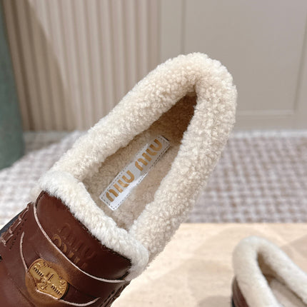 MIUMIU 25S PENNY LOAFERS 20MM IN EBONY BROWN BLEACHED CALFSKIN WITH SHEARLING