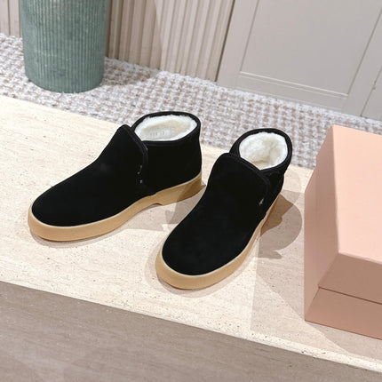 MIUMIU 25S SLIP-ON BOOTIES IN BLACK SUEDE WITH FAUX SHEARLING