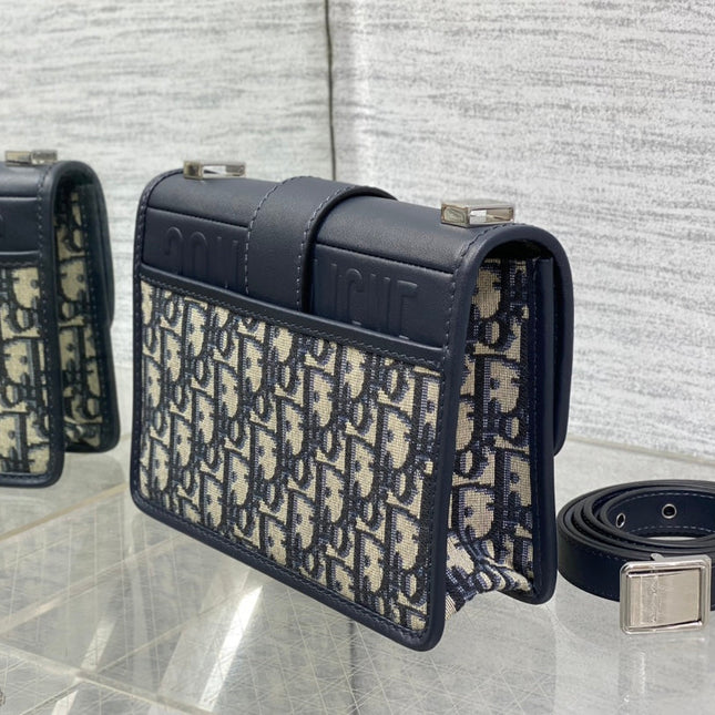 MONTAIGNE EAST-WEST 21 BAG WITH CHAIN IN NAVY BLUE LAMBSKIN AND MONOGRAM JACQUARD
