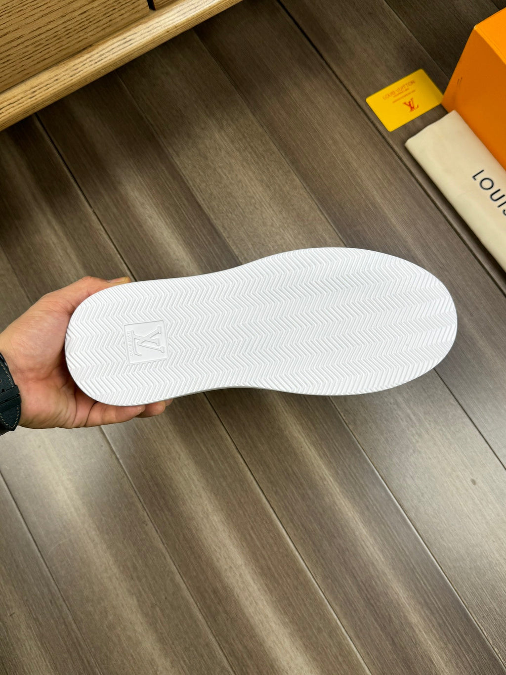 LV TRAINER SNEAKER WHITE AND BLACK CALFSKIN AND BREATHABLE FABRIC