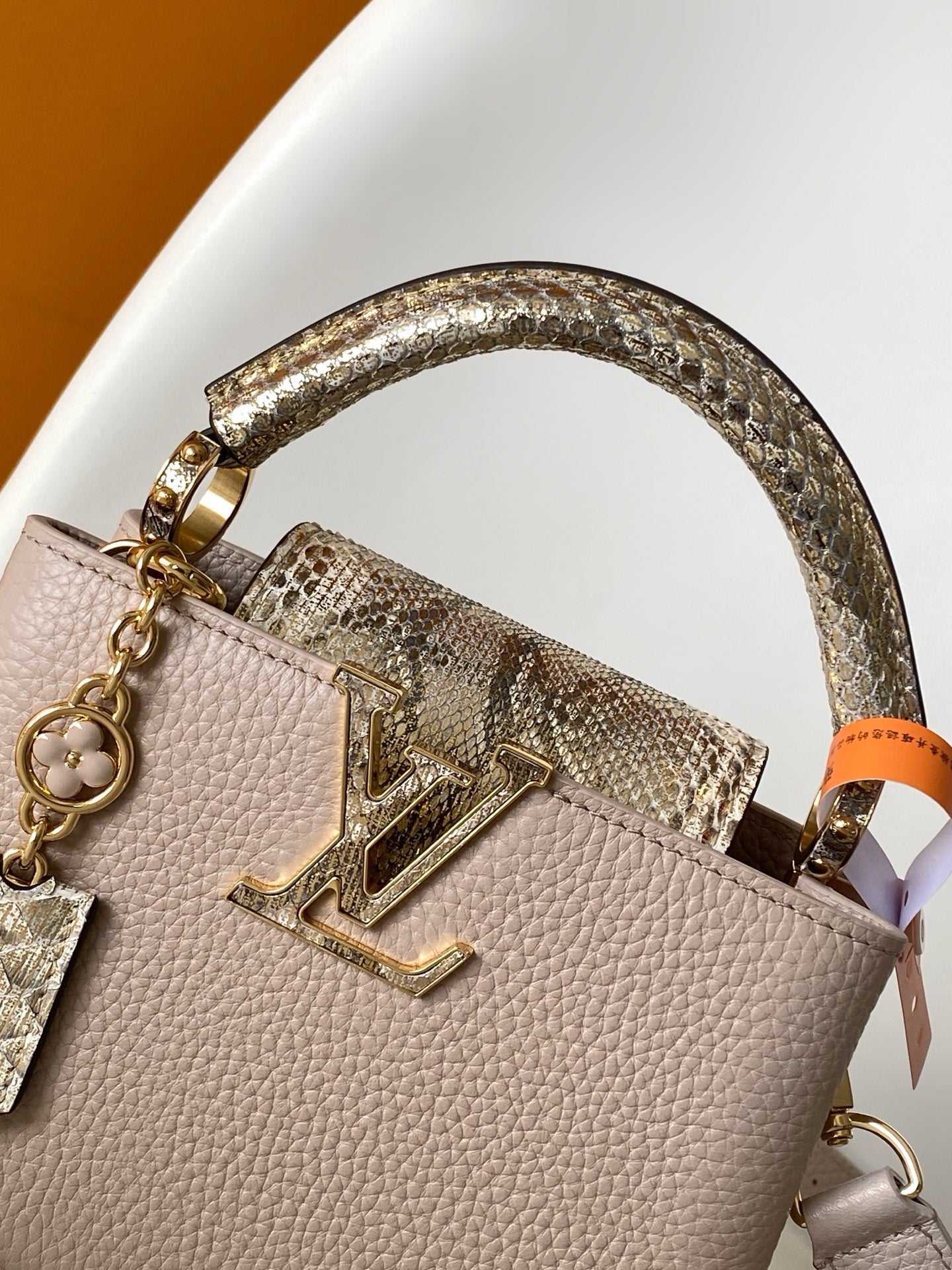 LV 26S CAPUCINES BAG 21 IN GRAYISH BEIGE TAURILLON CALFSKIN WITH GOLD HARDWARE