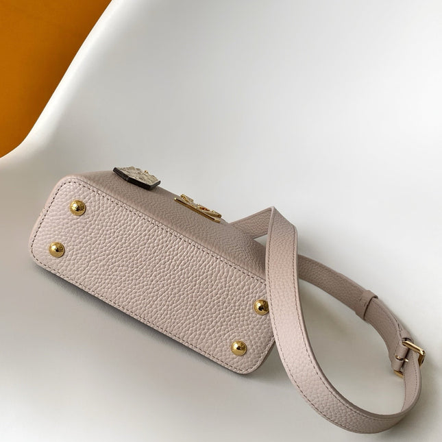 LV 26S CAPUCINES BAG 21 IN GRAYISH BEIGE TAURILLON CALFSKIN WITH GOLD HARDWARE