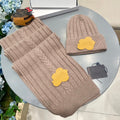 SET SCARF AND HAT IN LIGHT BROWN WOOL 419146