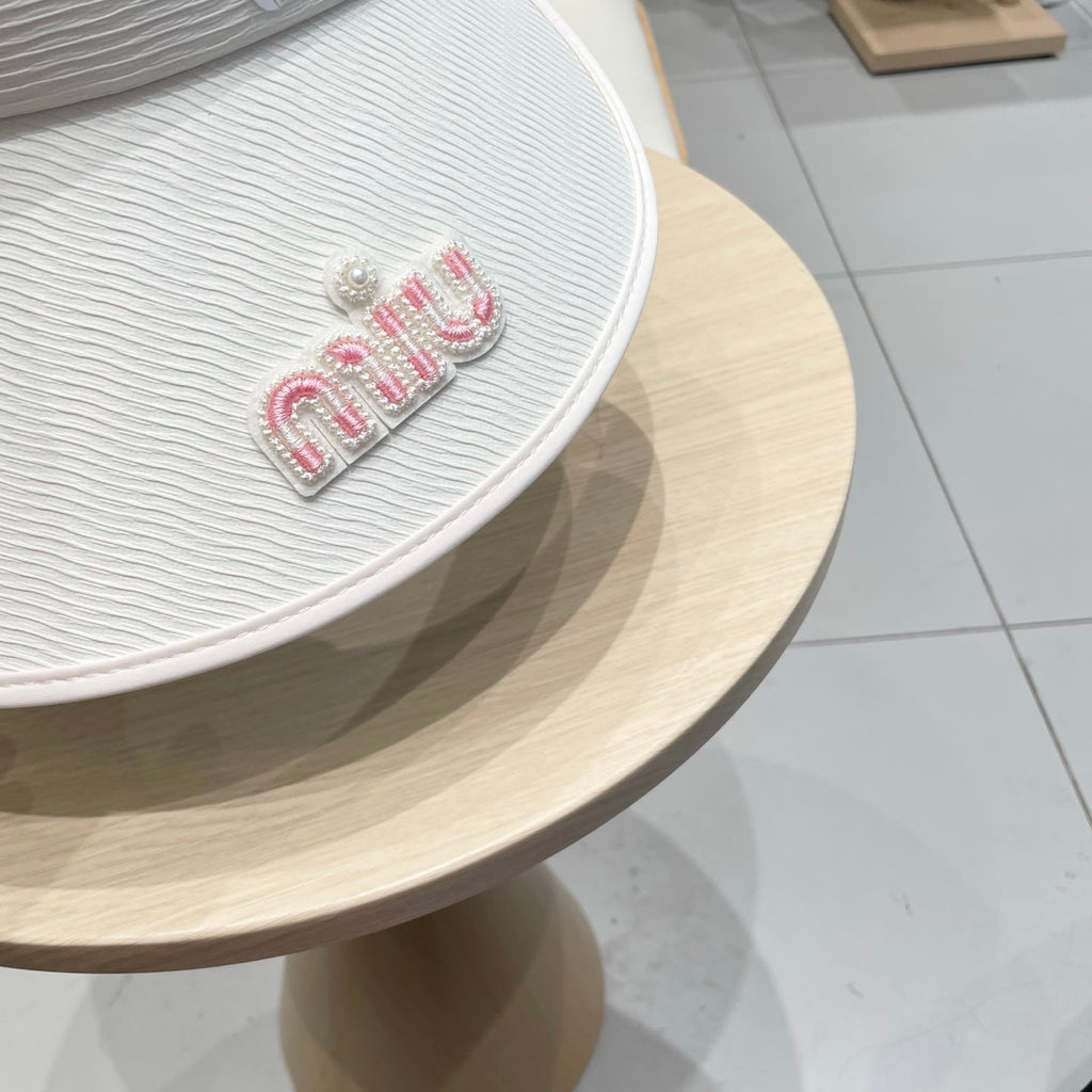 MIUMIU FASHION VISOR CAP IN BLACK AND WHITE WITH LOGO TEXT EMBROIDERY