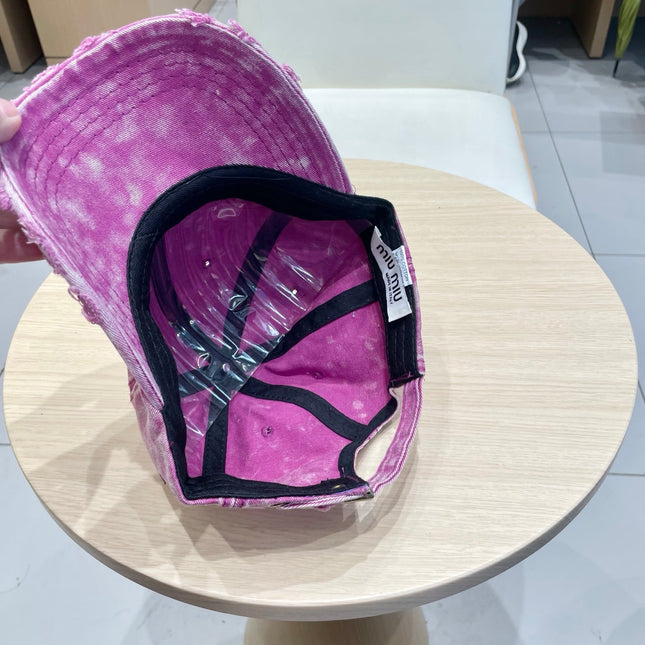 MIUMIU DISTRESSED FABRIC BASEBALL CAP IN PINK WITH EMBROIDERED LOGO