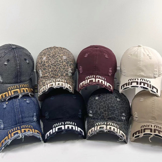 MIUMIU DISTRESSED EMBROIDERED BASEBALL CAP DENIM