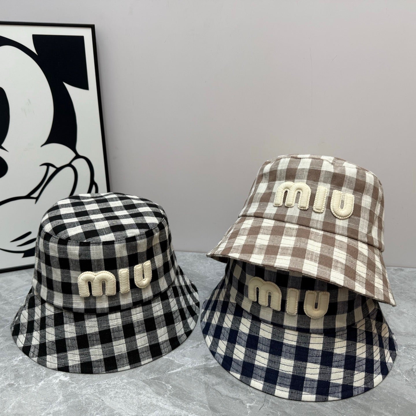 MIUMIU BUCKET CHECKED PATTERN WITH LOGO