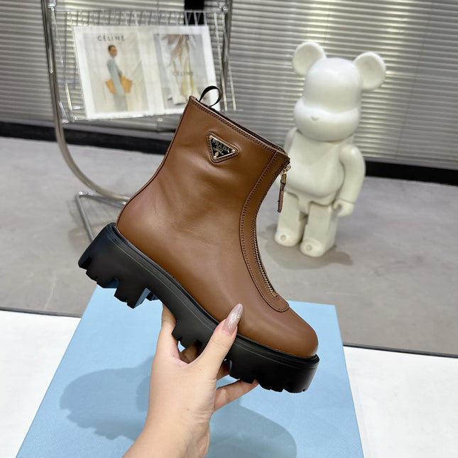 PRADA 25S ZIP-UP ANKLE BOOTS IN BROWN CALFSKIN