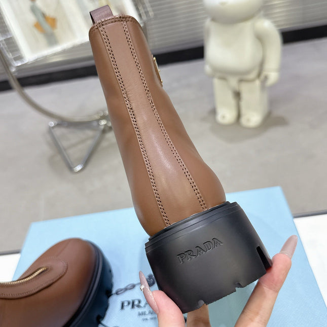 PRADA 25S ZIP-UP ANKLE BOOTS IN BROWN CALFSKIN