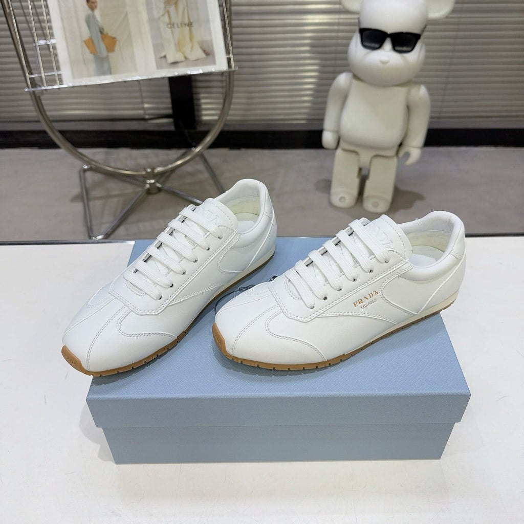 PRADA 26S LACE UP SNEAKERS IN WHITE CALFSKIN